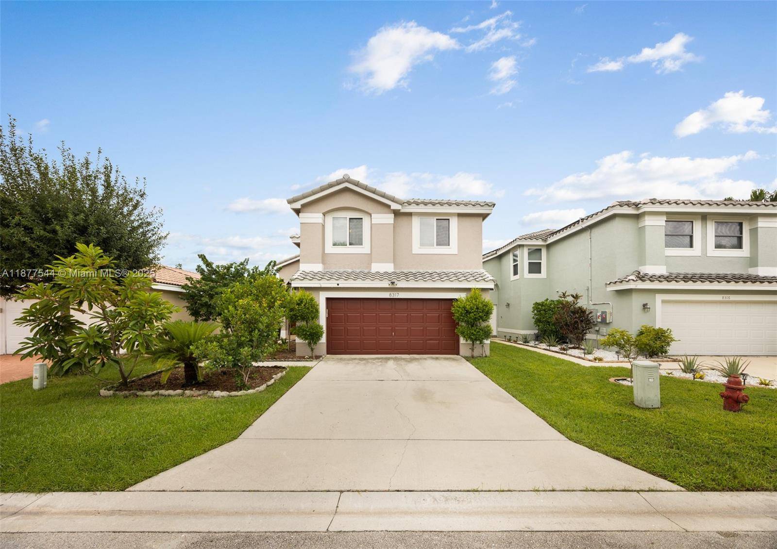 Spacious Mediterranean style two story home offering a refined sense of elegance and light.
