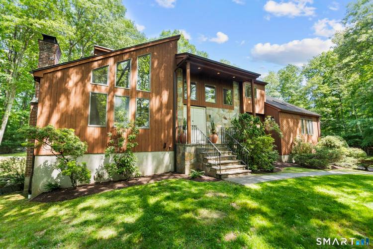 Welcome to 732 Den Road, your own secluded retreat tucked away in the heart of North Stamford.