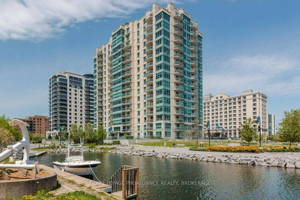 Welcome to lakeside luxury living at 203 5 Gore Street in the prestigious Royal George in downtown Kingston !