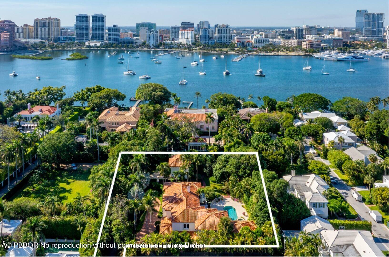 Fantastic In Town Estate on oversized 1 acre lot, just one house from the Lake Trail.