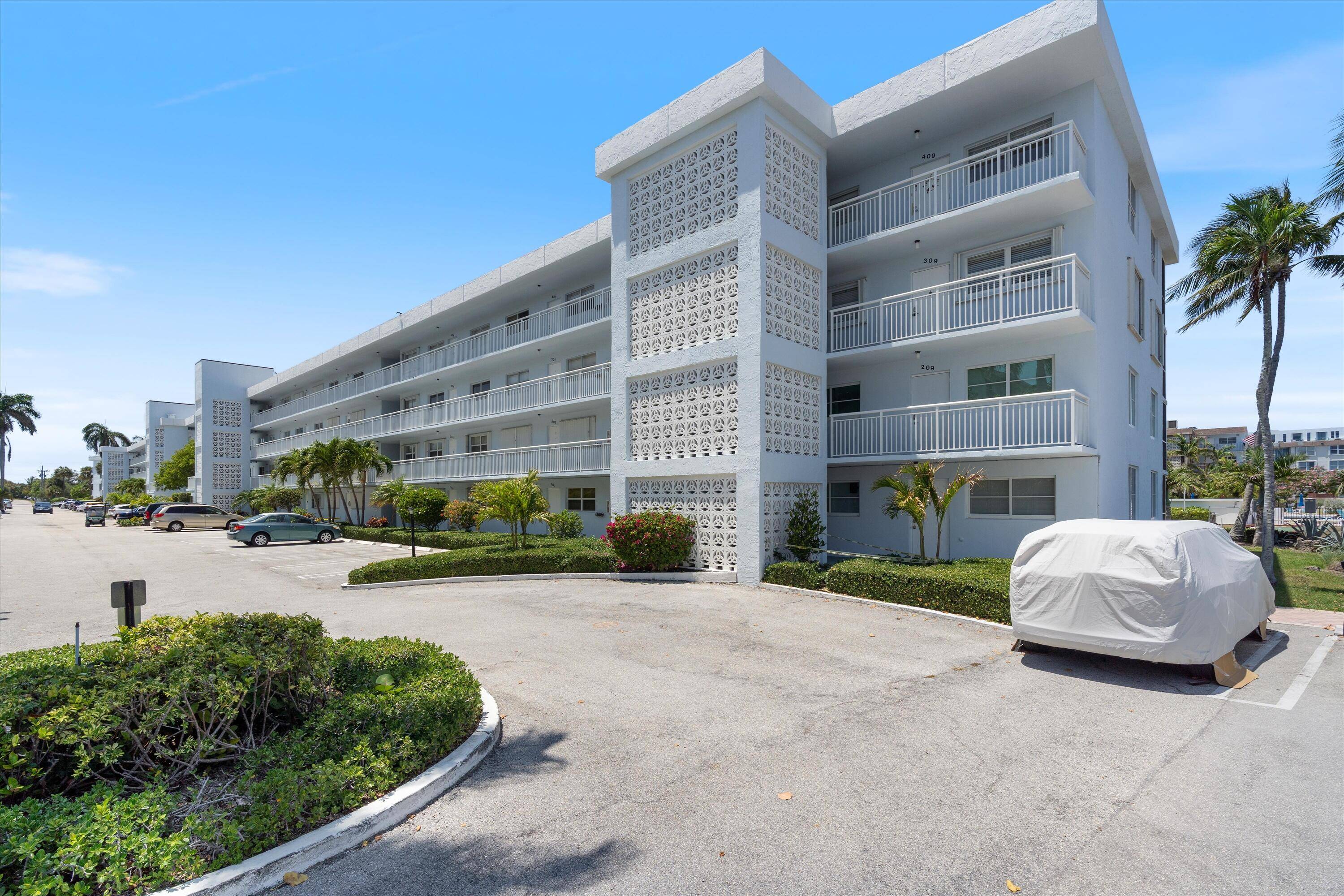 Enjoy Coastal Living in This Light Filled Waterfront Condo.