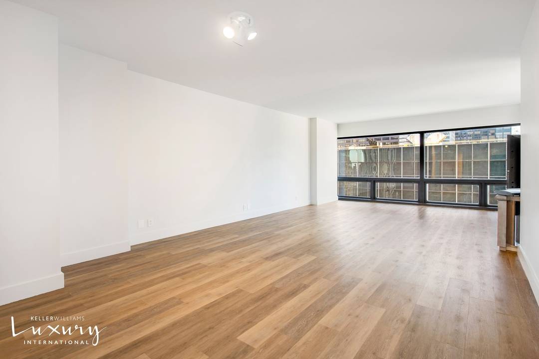 As you enter through the foyer of this sophisticated corner two bedroom, two and one half bathroom apartment, you step into a spacious sunlit corner living room large enough to ...