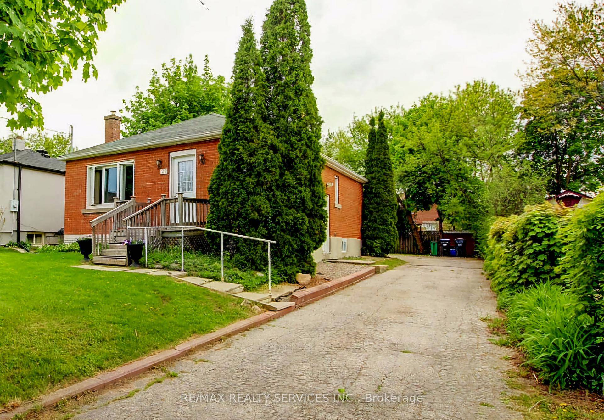 Beautiful 2 2 bedroom, 2 bath, all brick detached bungalow with a separate side entrance on a premium 50' X 130' lot !