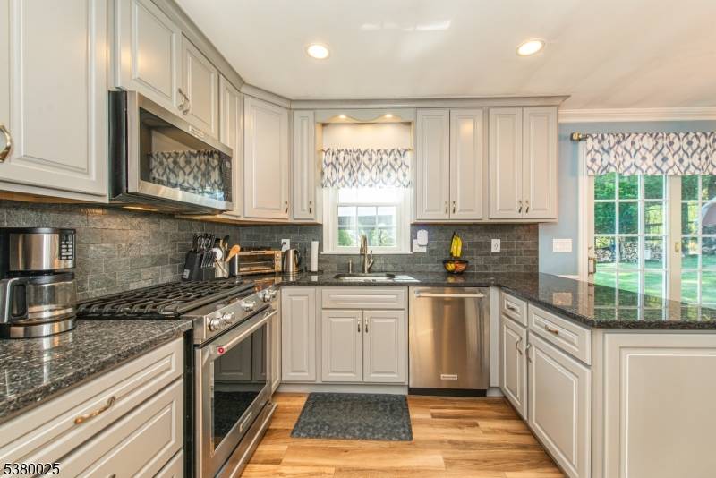 Move right in ! This beautifully renovated split level home offers modern style and comfort throughout.