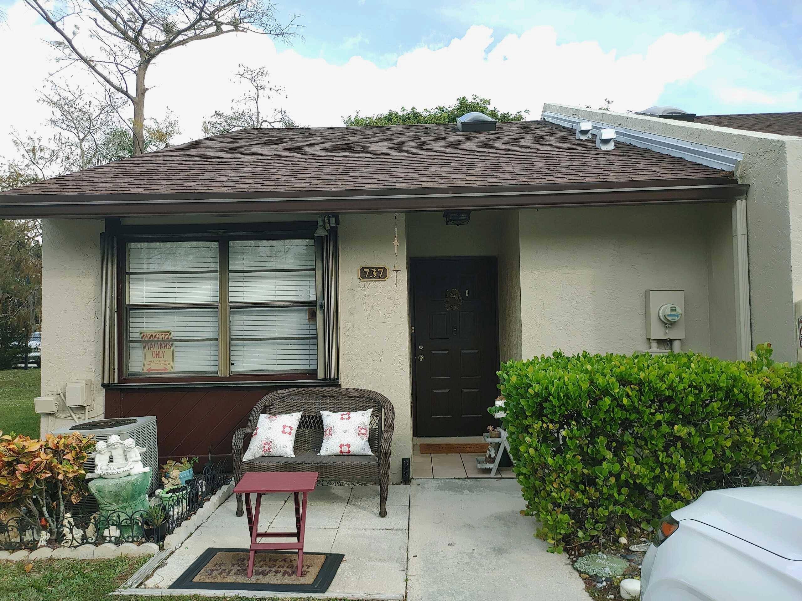 WELL KEPT CORNER HOME WITH REMODELED KITCHEN WITH WOOD CABINETS AND STAINLESS STEEL APPLIANCES.