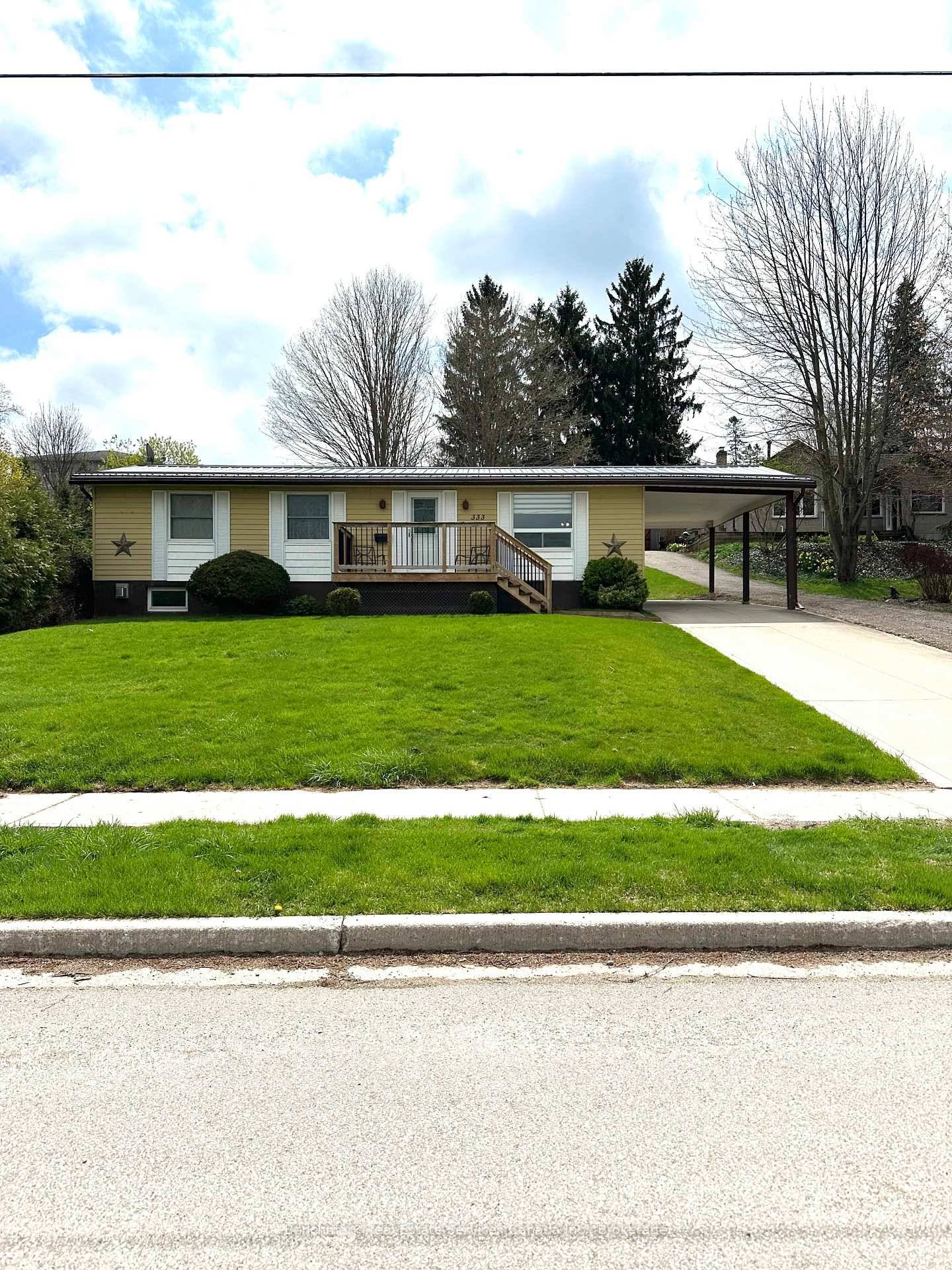 Experience peace and comfort with this charming bungalow, situated in the peaceful town of St.