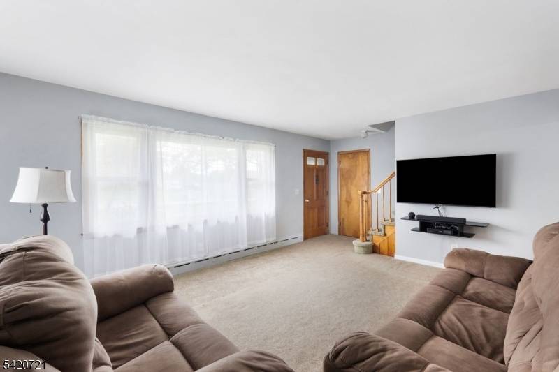 Rare 4 BEDROOM 2 FULL BATHROOM Single Family Home on Nearly 2 ACRES of Level Property.