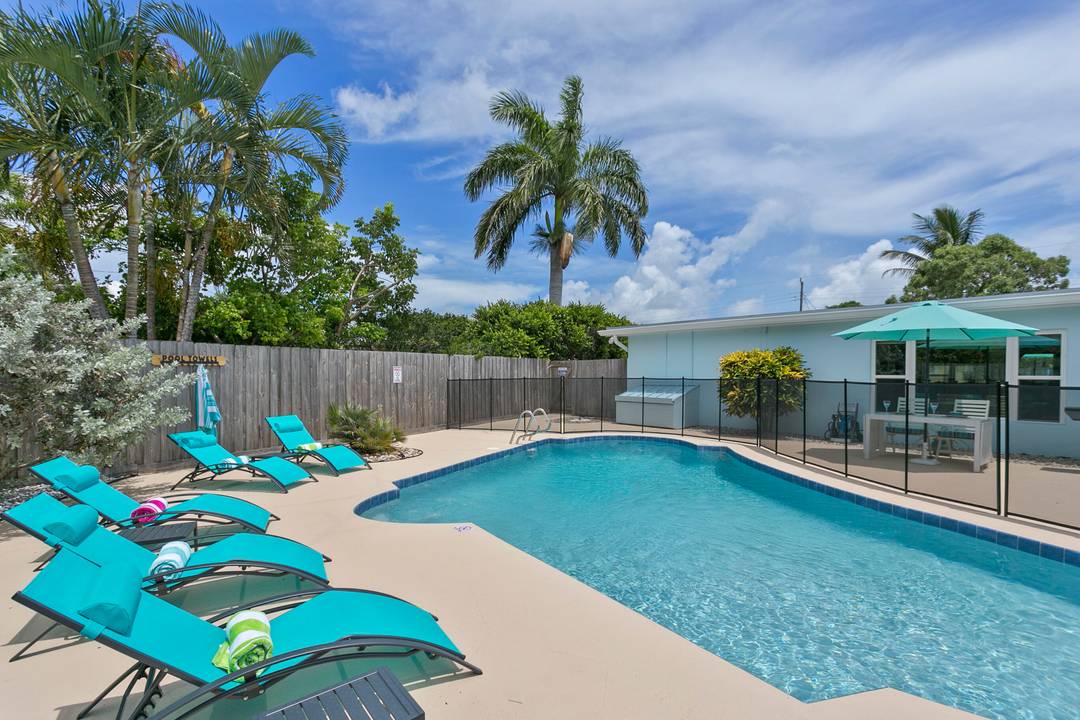 Completely remodeled 4 bed 2 bath home with a private heated pool and fully fenced backyard oasis making every day feel like a vacation !