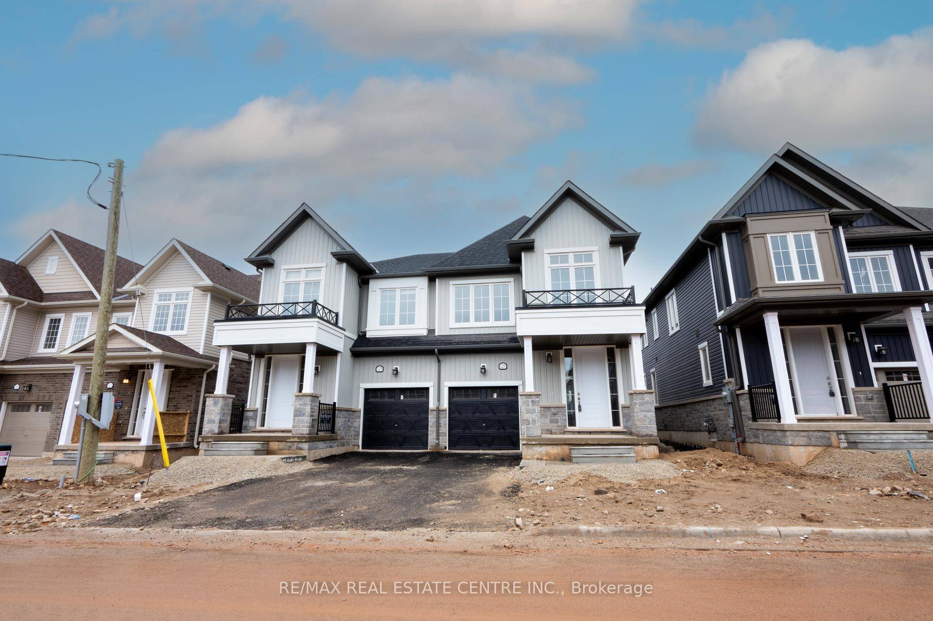 Discover this stunning brand new 1, 877 sq ft home by Solmar in the desirable Erin Glen community, offering a perfect blend of luxury and tranquility.