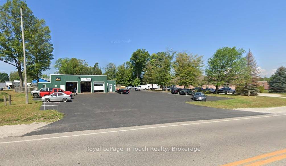 EXCELLENT LOCATION ON BUSY HIGHWAY WITH PLENTY OF PARKING, 2400 SQ FT SHOP AREA amp ; 320 SQ FT OFFICE SPACE.