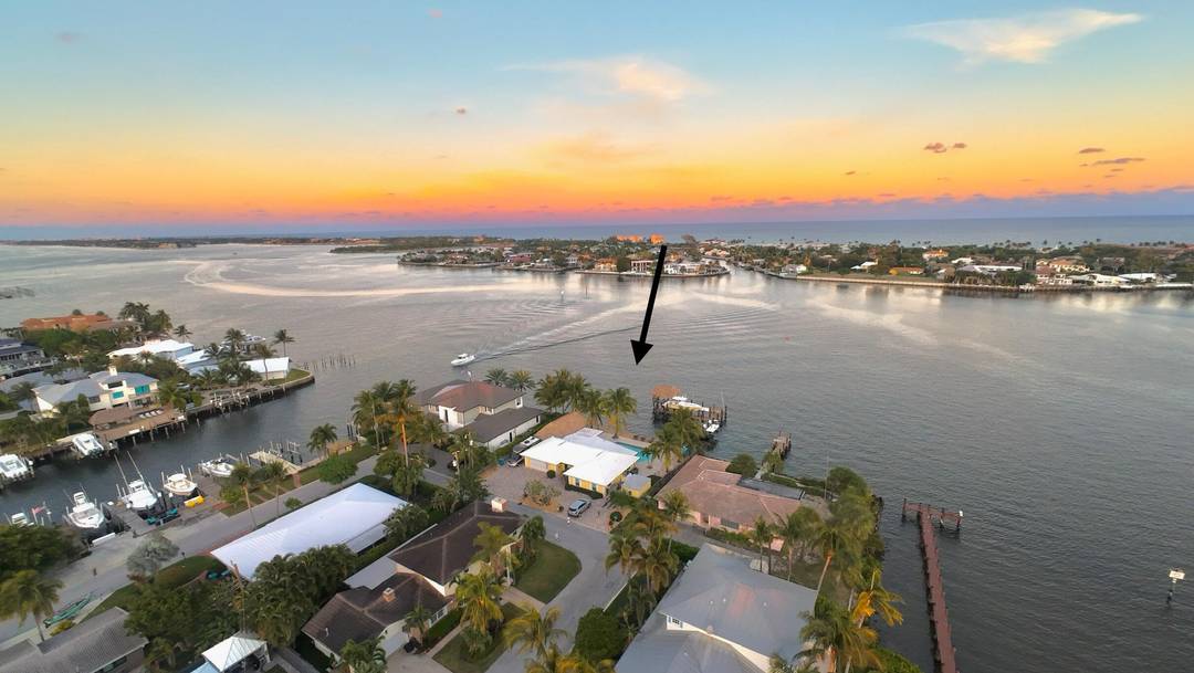 Escape to this beautifully updated tropical waterfront home, where serene water views and vibrant natural light surround you from every room.