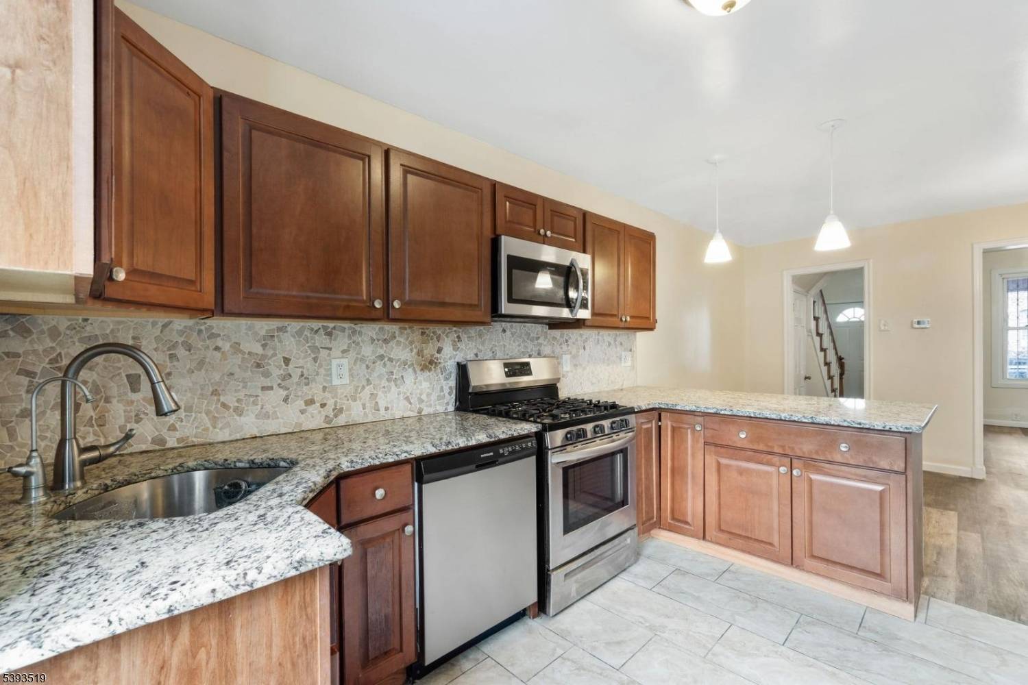 Charming and updated 3 bedroom, 2 bathroom brick rowhouse in Newark's Mount Pleasant Lower Broadway neighborhood, directly across the street from Roberto Clemente Elementary School.