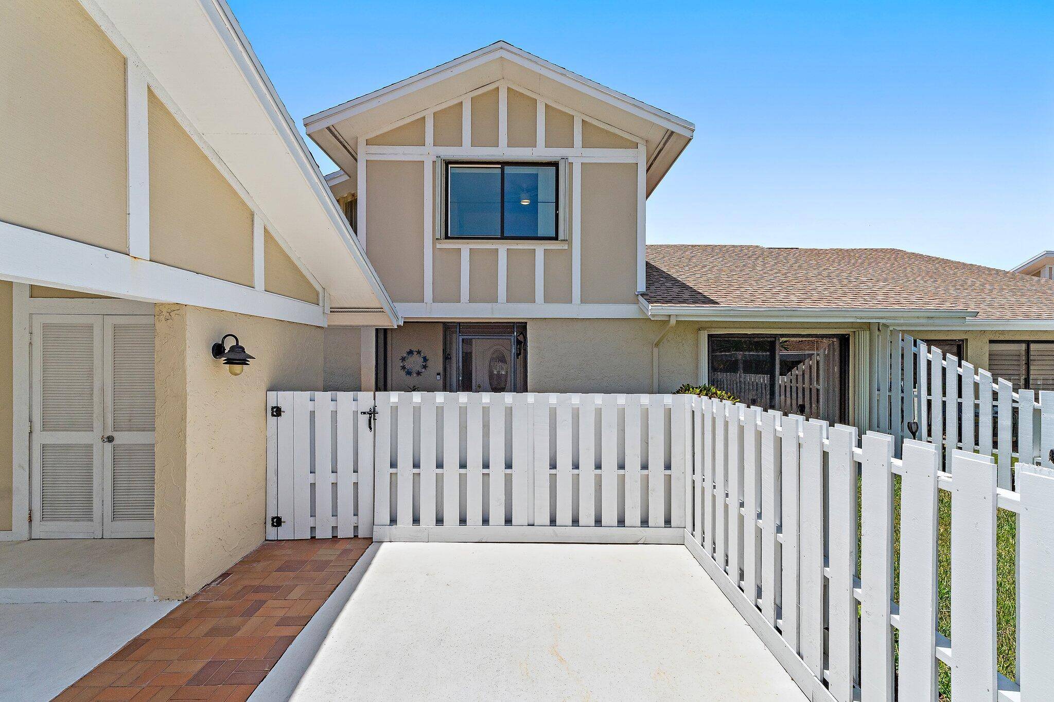 Located in the gated golf community of Jonathan's Landing, this 3 bedroom, with den, townhome offers a rare blend of privacy, functionality, and low maintenance living just minutes from Jupiter's ...