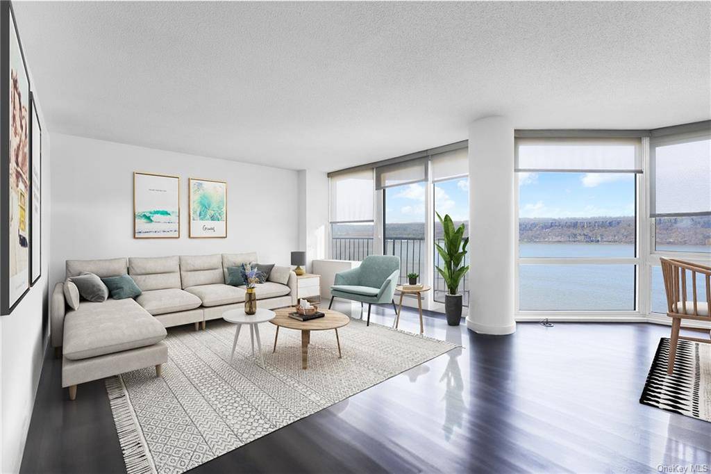 South facing stunning, panoramic Hudson River views in this exquisite condominium, nestled in a 24 hour doorman building with a deeded parking space perched on the river's edge.
