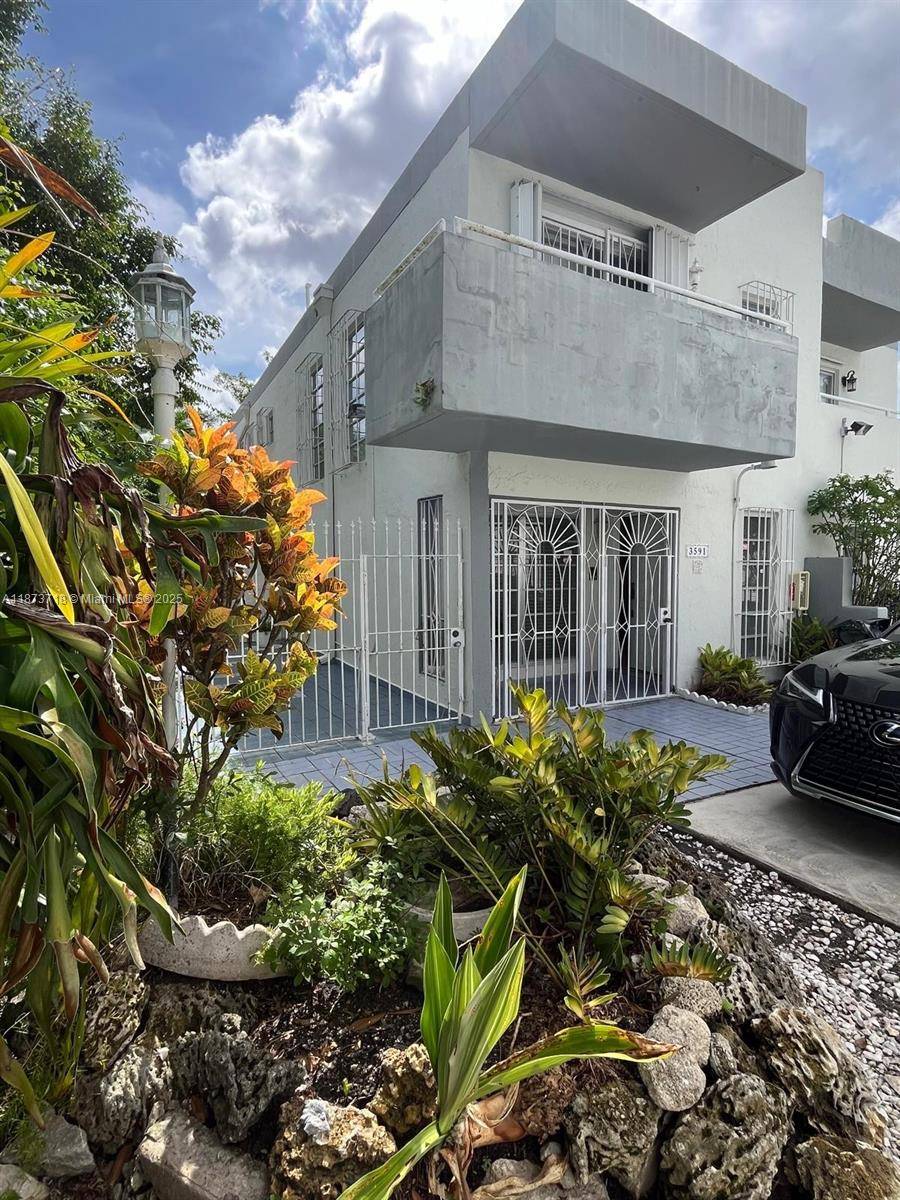 Rarely available in Coral Gate s Alhambra Manors gated community, this 3BR 2.