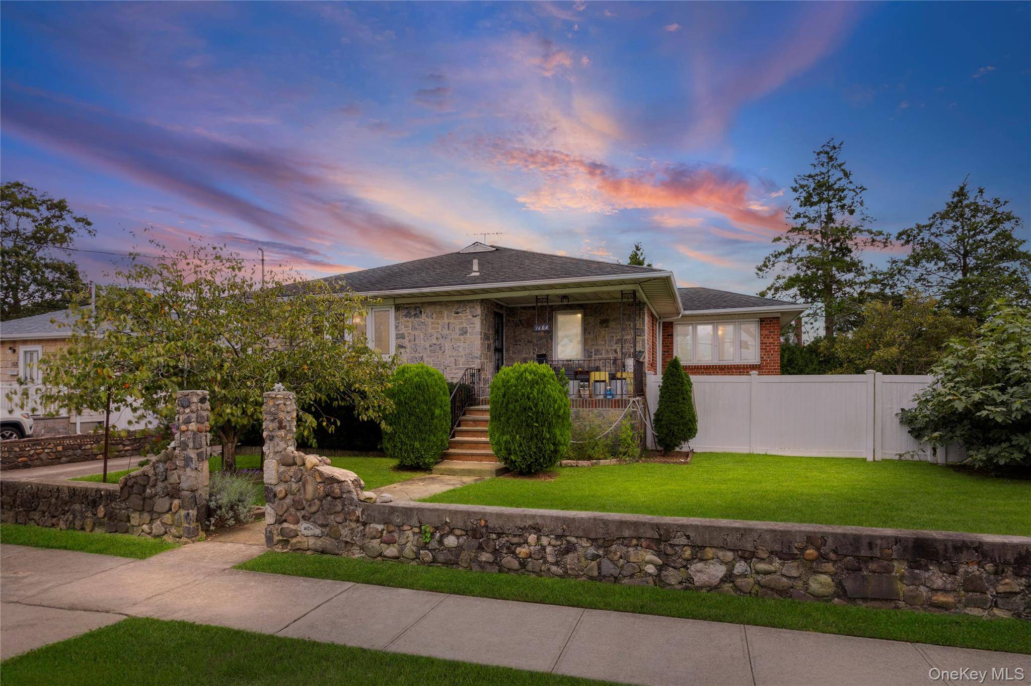 Charming three bedroom, two bath stone ranch offering character, comfort, and plenty of space.