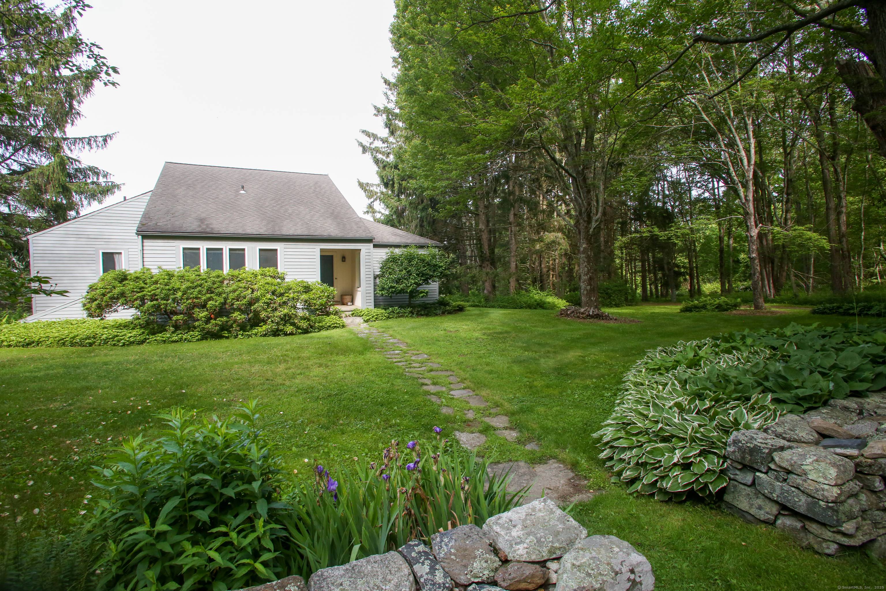 Dream retreat in South Kent on nearly 25 high acres with potential to create views of rolling hills to the west.