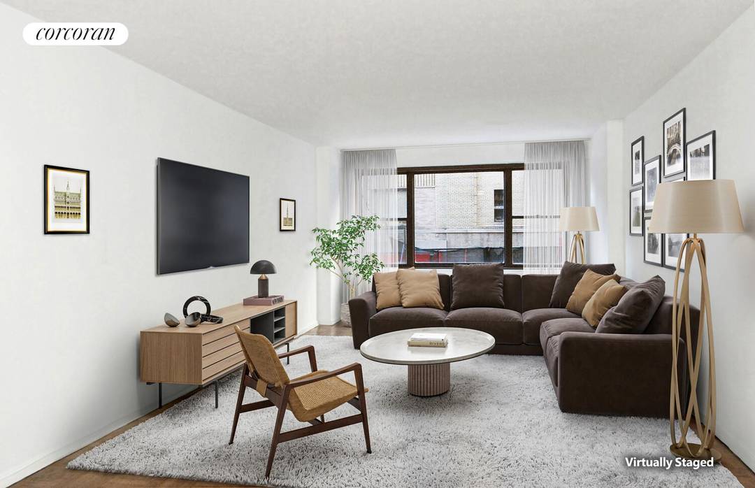 Attention Buyers NO BOARD APPROVAL for this large, south facing, corner 5 room residence, easily convertible to a three bedroom.