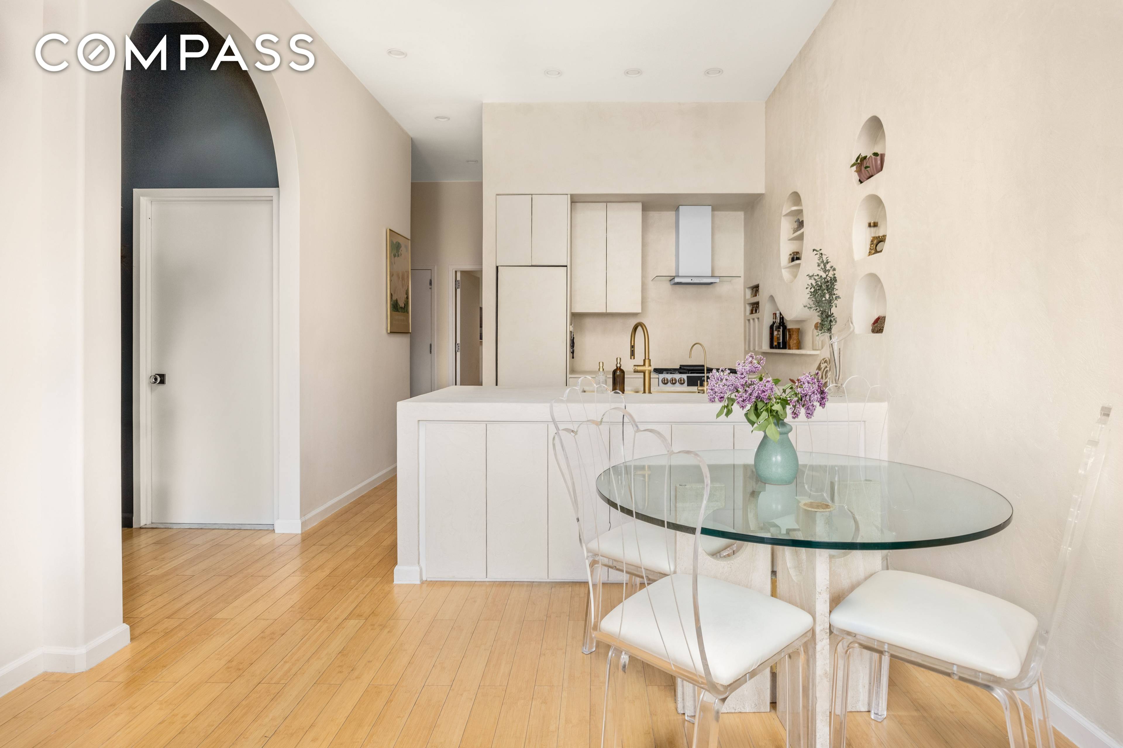 Located in the historic district of Greenpoint, this professionally designed 2 bedroom, 1.
