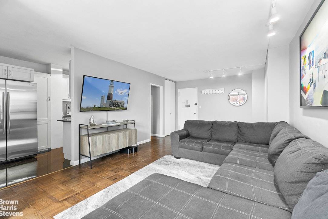 Welcome to this beautifully updated and expansive converted 2 bedroom home in the ideally located Upper East Side full service Lenox House.