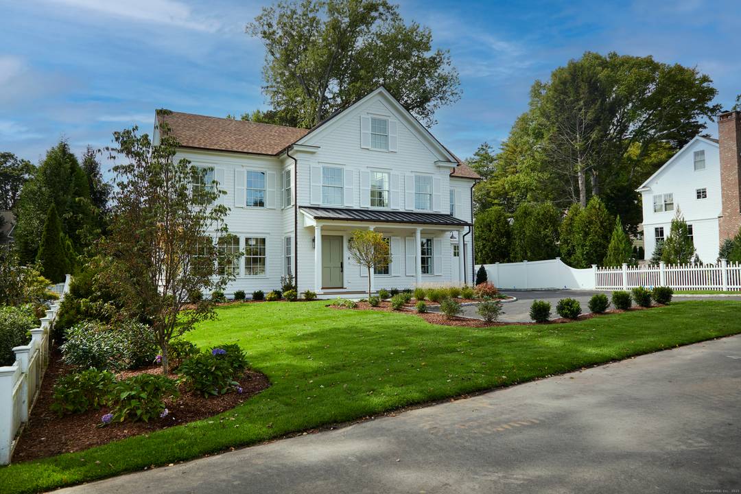 Nestled in one of Westport's most desirable walk to town neighborhoods, this exceptional new construction home combines timeless charm with modern luxury.