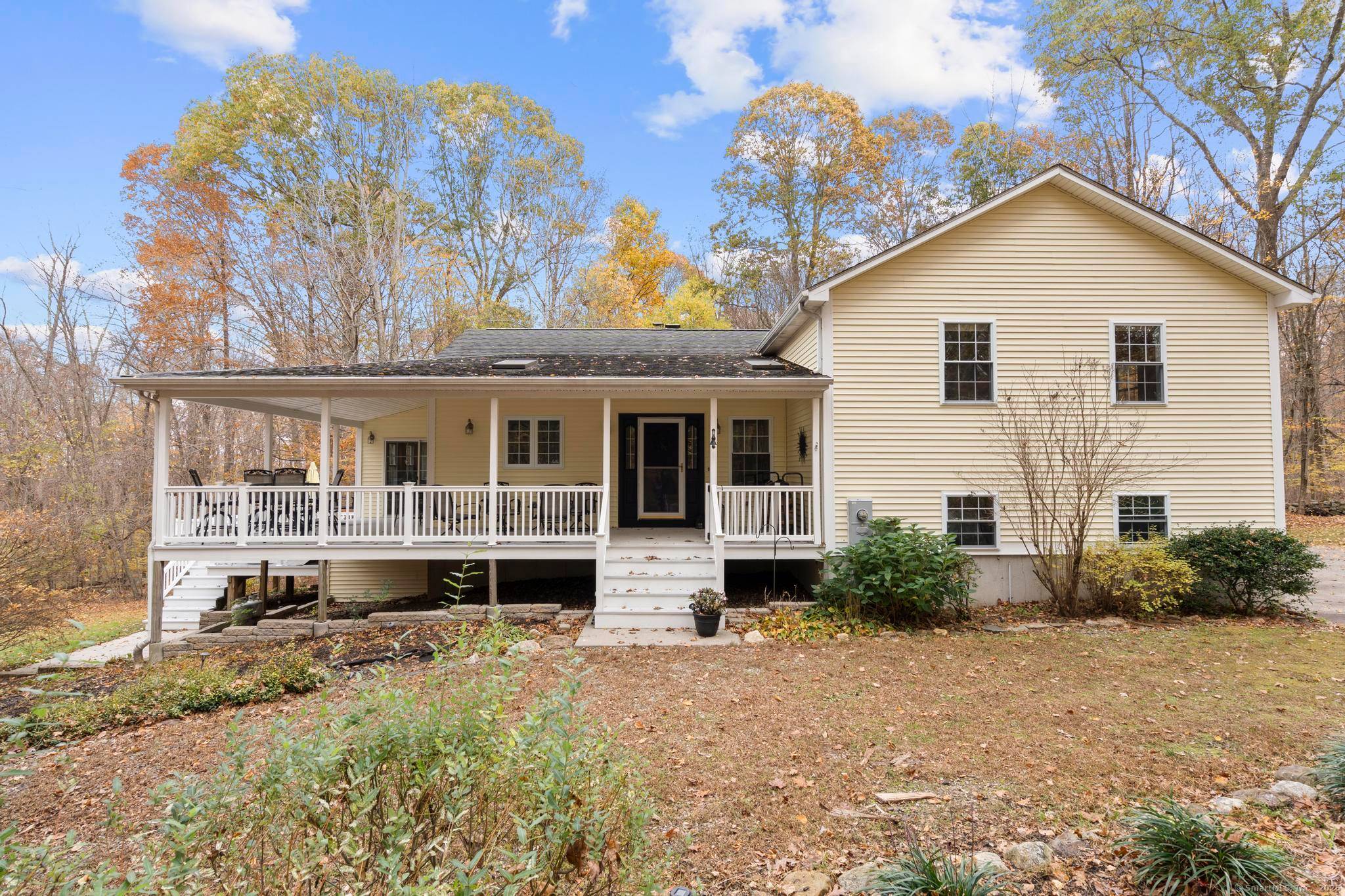 This exceptional home sits on a rear lot with almost 7 acres of beautifully landscaped property with abundant privacy !