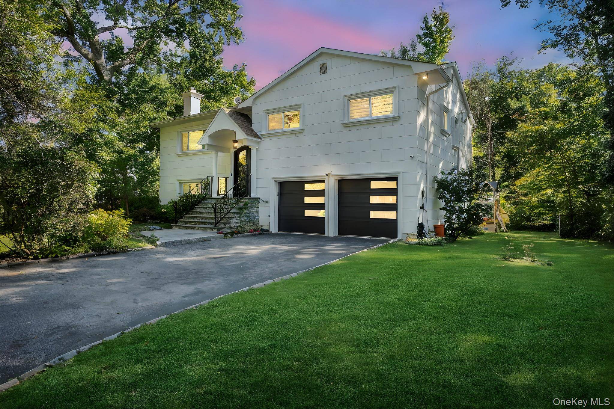 Welcome to this beautifully renovated 4 bedroom, 3 bathroom home located in the heart of Great Neck.