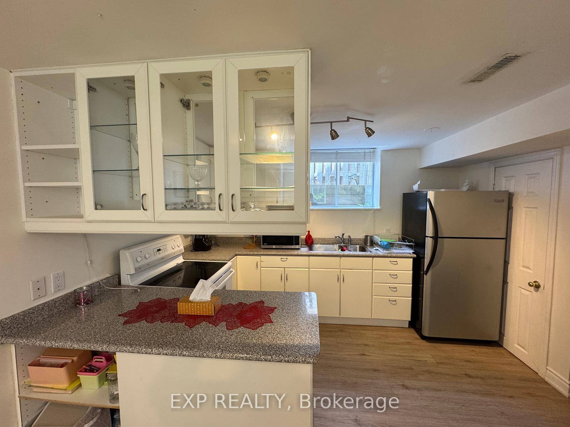 This beautifully finished basement apartment features a spacious bedroom and a private side entrance, offering the perfect setup for couples, students, or anyone seeking independent living.