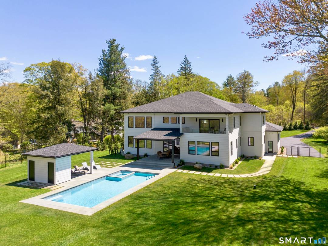 Custom built in 2022 by a top builder for his own family, this exceptional Easton residence offers a level of quality and execution rarely available.