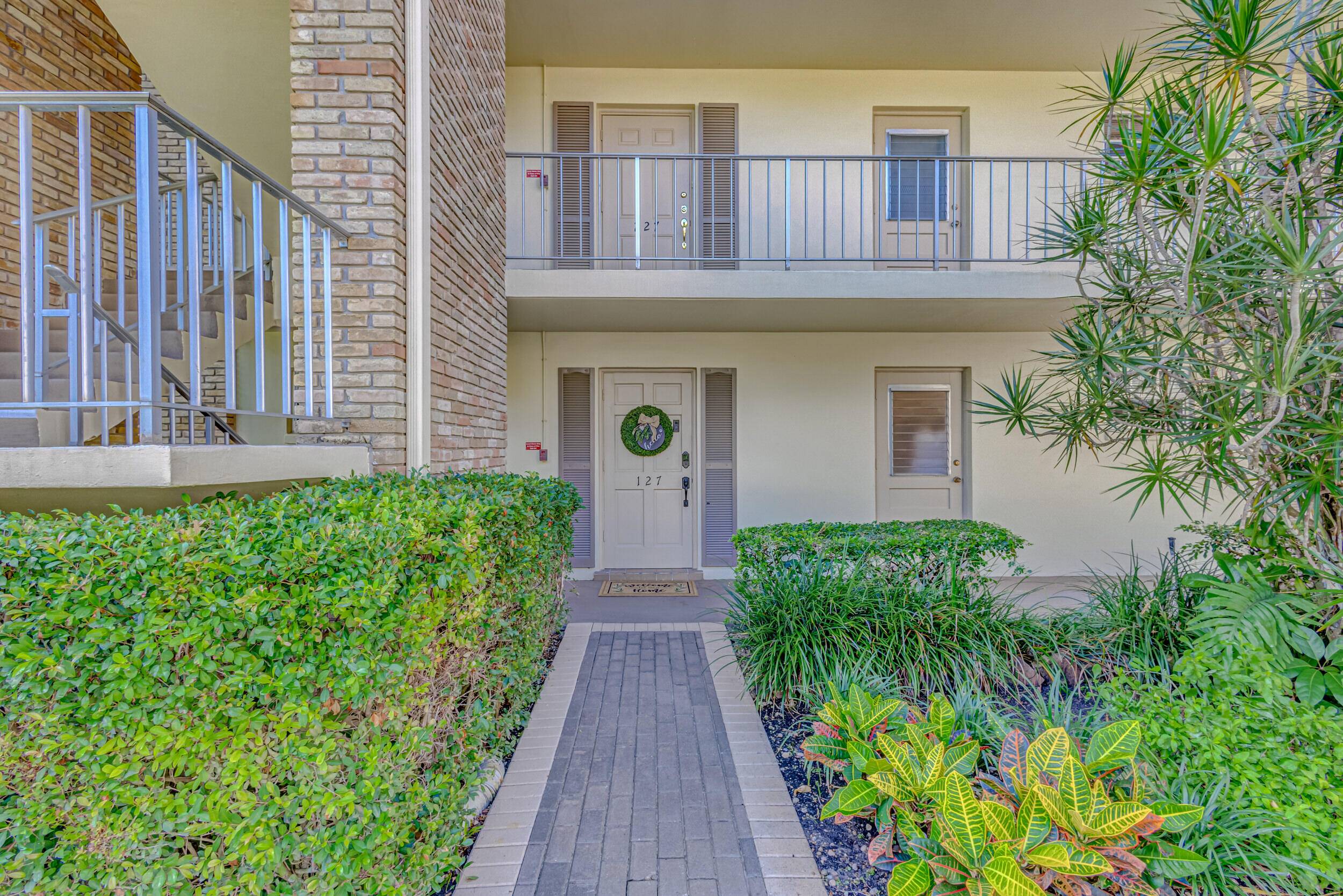 This stunning, fully renovated 1st fl corner condo offers an incredible blend of modern design and functionality.