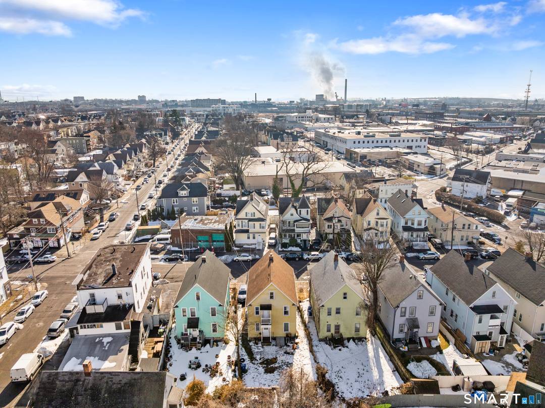 Renovated in 2025 this 2 family home features 11 Rooms, 5 Bedrooms, 2 Full 1 Half Bathrooms.