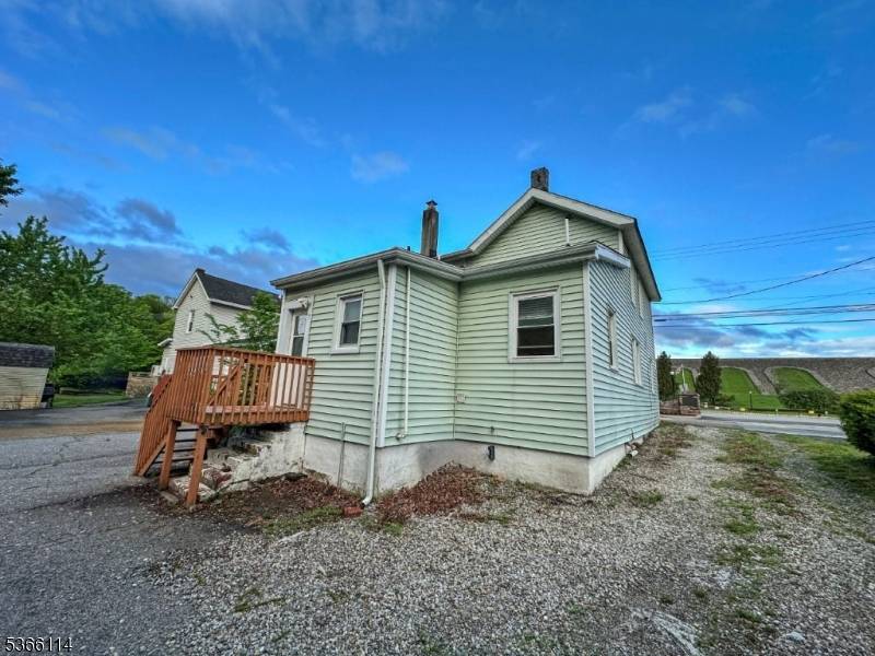 CIRCA 1900 Colonial Home with Commercial Potential in the Heart of WanaqueThis spacious older colonial offers 1, 716 square feet of charm and opportunity, featuring three or four bedrooms and ...