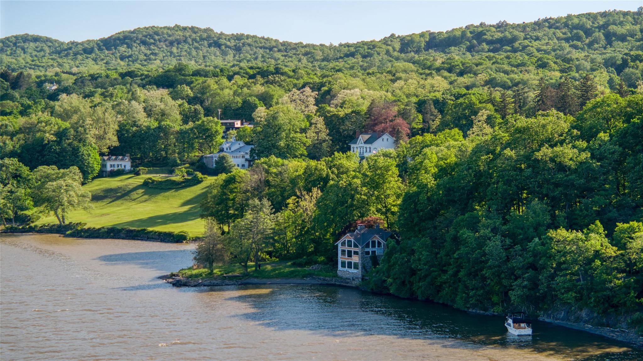 A Rare Hudson Riverfront Opportunity Historic Stone Home with Unmatched Views and Endless Potential It's not often a property like this becomes available a one of a kind 1870s stone ...