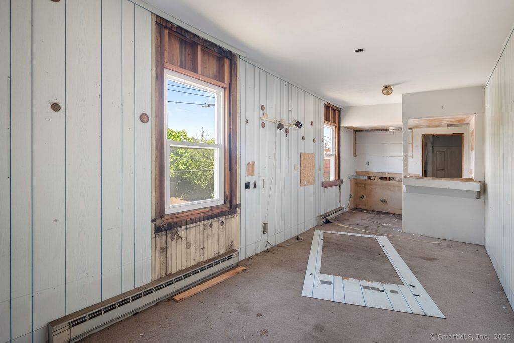 This rare and highly adaptable mixed use property offers nearly 8, 000 SF of space across two buildings.