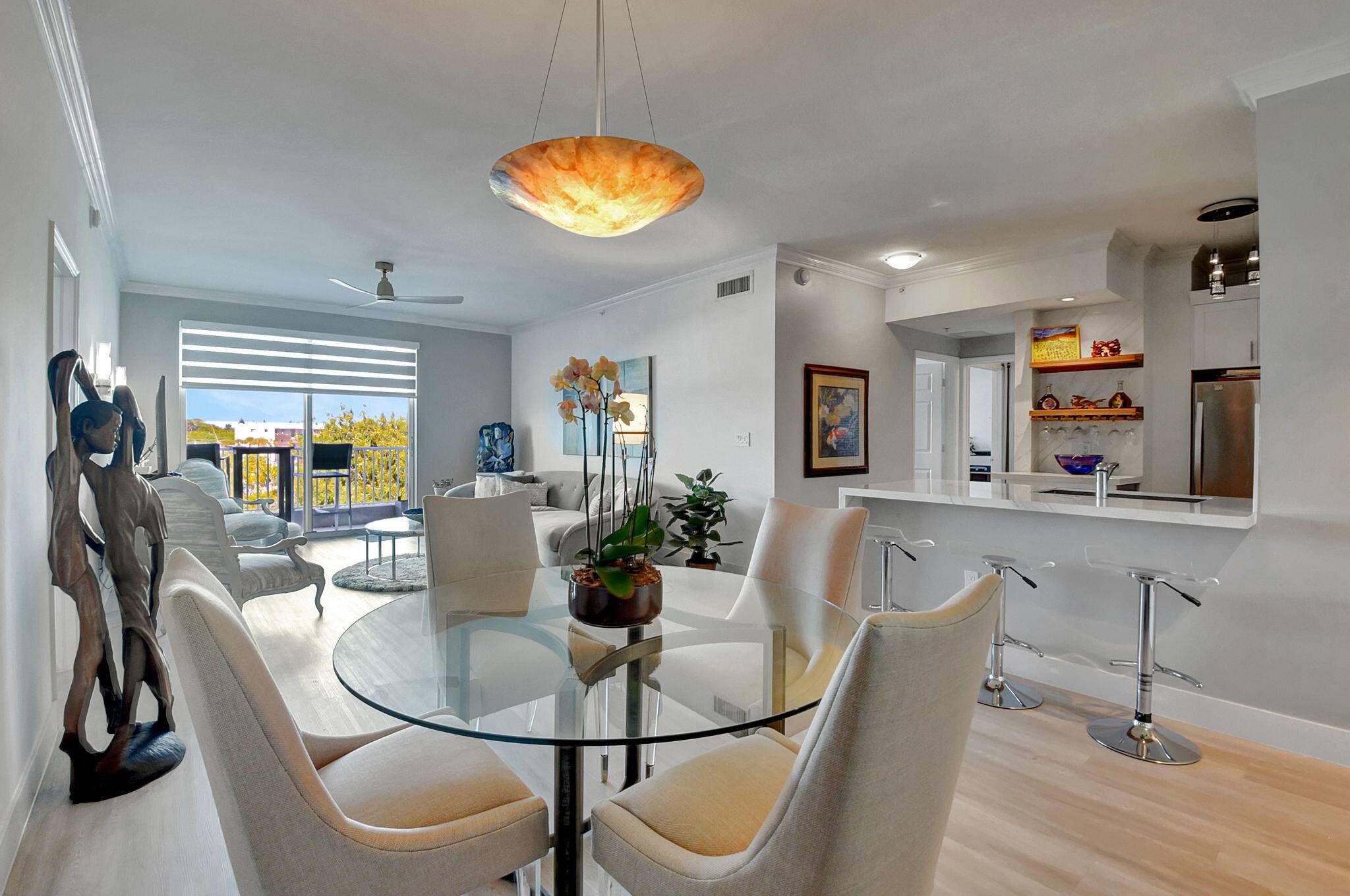 This beautiful Moorings 3 bedroom condo has been designer updated with new Opened kitchen and two remodeled baths, new blonde vinyl plank flooring throughout, new designer lighting and fans, and ...