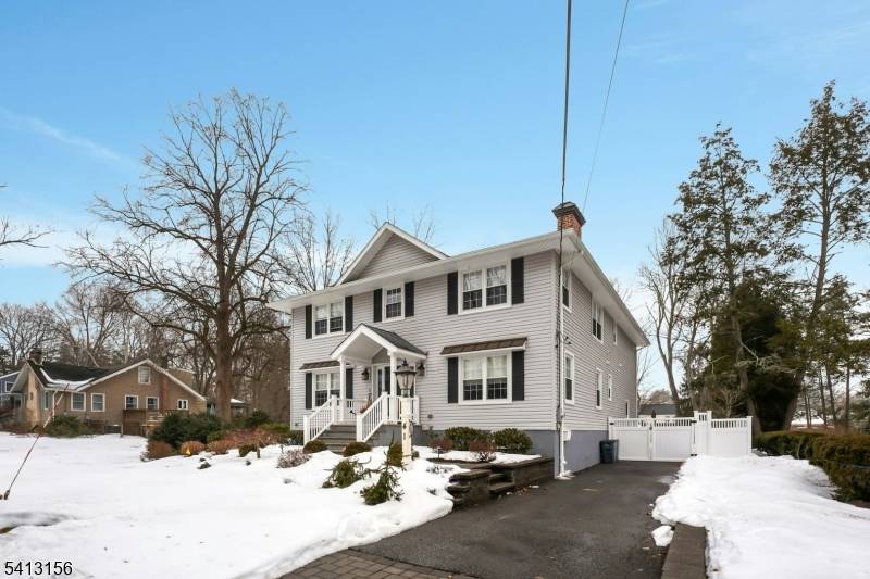 Beautifully appointed colonial showcasing a distinctive blend of modern design and refined decor.