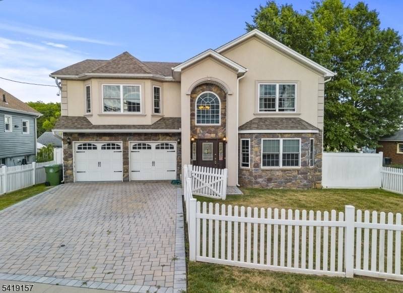 Welcome to 431 Raritan Rd, a beautifully crafted Colonial home built in 2013, ideally located in Linden's desirable Sunnyside neighborhood.