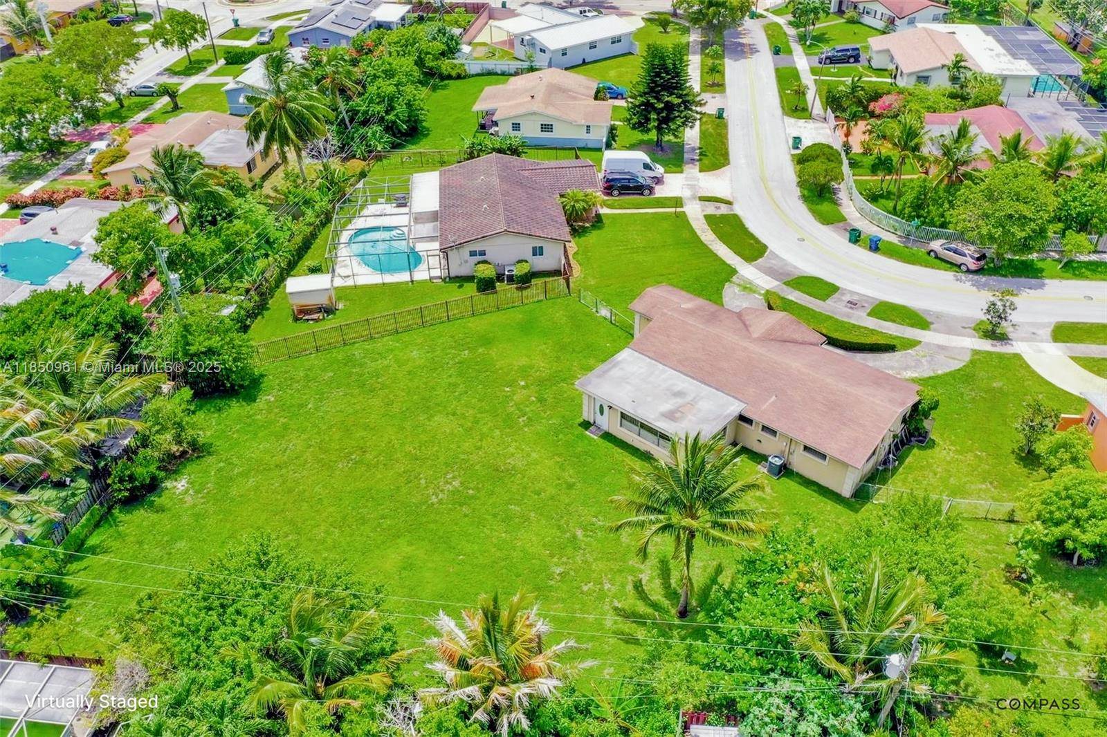 Spacious 3 Bedroom, 2 Bath Home situated on a massive 16, 000 sq ft lot offering endless possibilities for outdoor living !