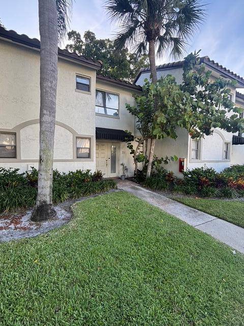 Welcome to this bright and spacious 2 bedroom, 2 bath townhome in East Boca Raton !