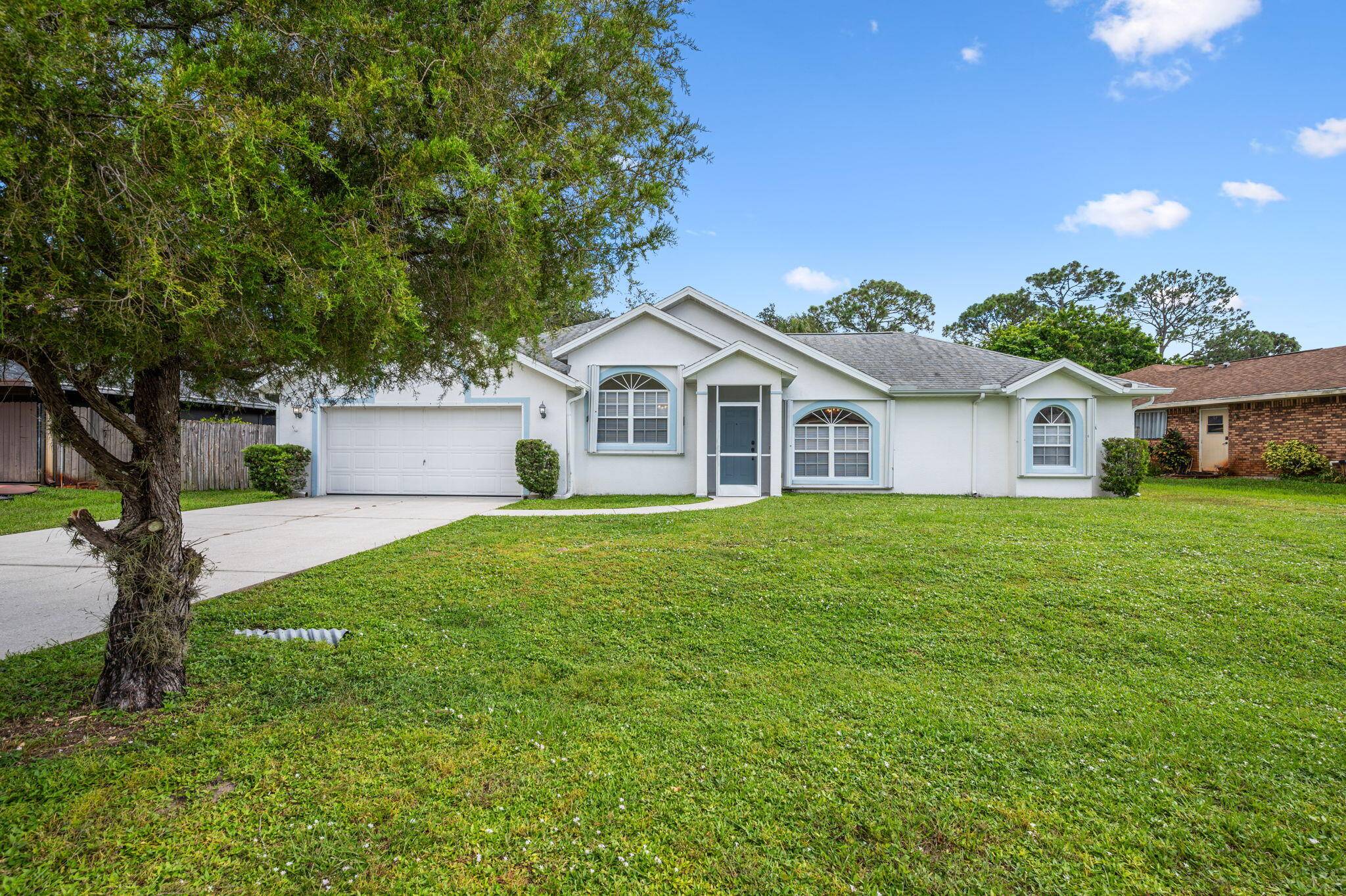 Step into timeless comfort with this beautifully maintained concrete block POOL home, where thoughtful upgrades meet effortless style.