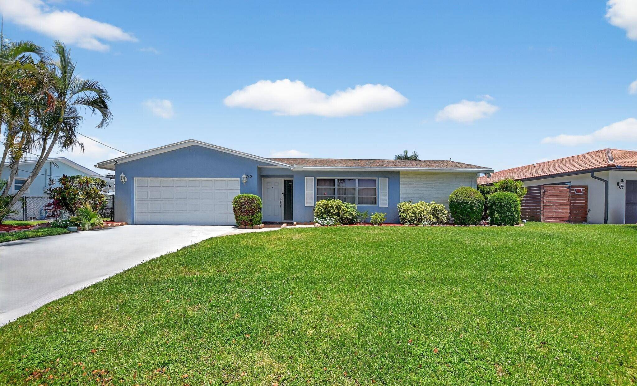 Waterfront living with no HOA in sought after Golfview Harbour !