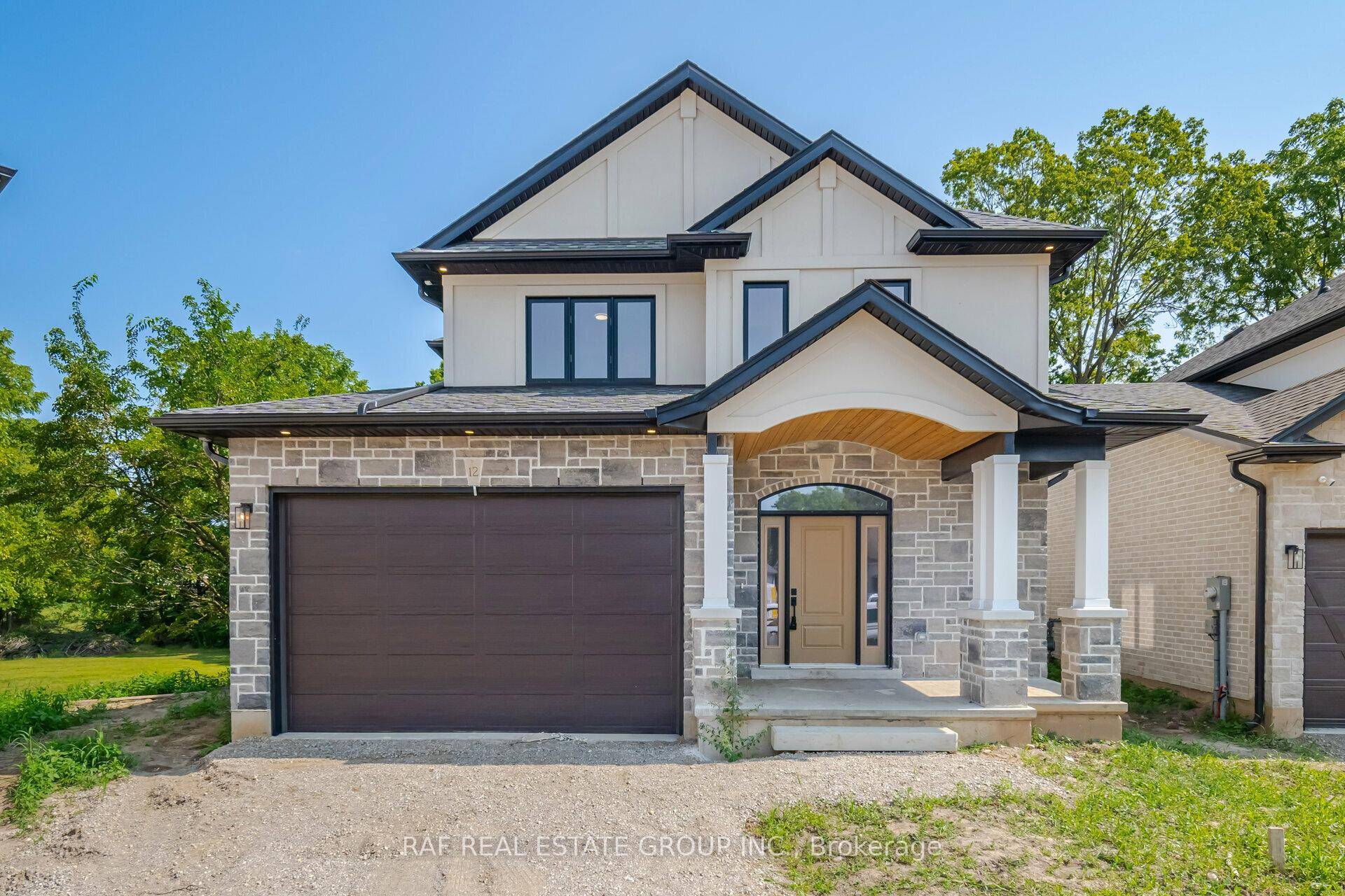 Welcome to 12 242 Mount Pleasant, Less than a year old 3 bedroom, 3 bathroom detached home in the prestigious Lions Park Estates of Brantford.