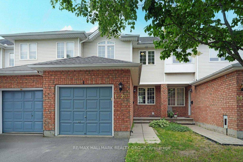 UPDATED FREEHOLD townhome nestled on a quiet, child friendly street.