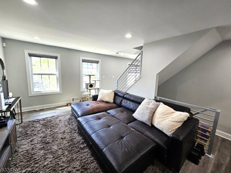 TOTALLY RENOVATED AND WELL MAINTAINED 2 BR UNIT IN THE SOCIETY HILL COMMUNITY IN DOWNTOWN NEWARK WITH AN OPEN FLOOR PLAN FEATURING LUXURY VINYL PLANKS ON BOTH LEVELS.