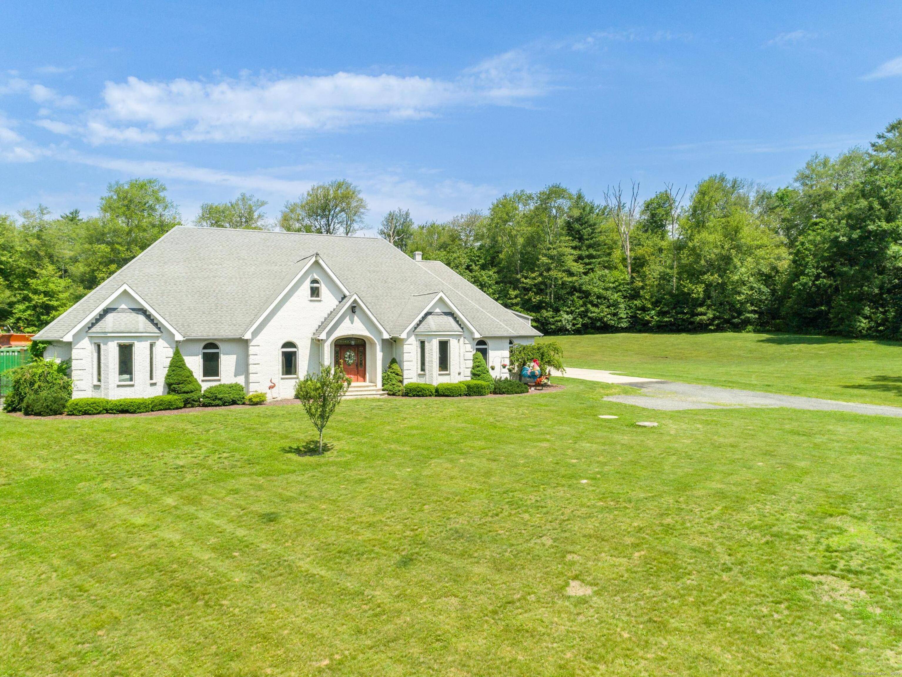A one of a kind stunning Contemporary Ranch custom built by the current owners !