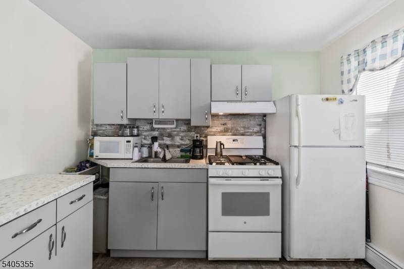 Excellent opportunity to own a legal three family income producing property on a 25x100 lot in the heart of Paterson !