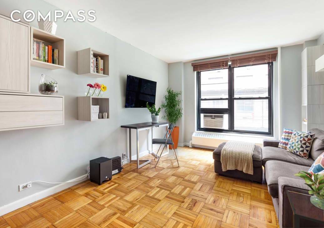 OWN FOR LESS THAN RENTING This generously sized alcove studio has been converted into a very spacious one bedroom apartment.