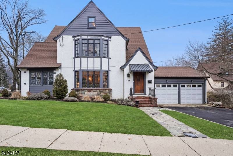 This beautifully updated five bedroom, three bath home blends timeless architectural charm with modern updates.