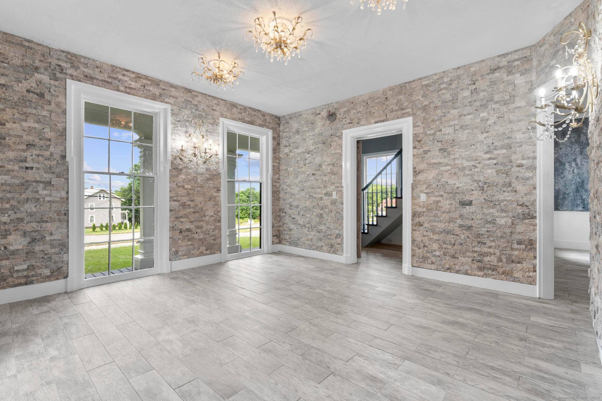 This fully remodeled first floor commercial space offers exceptional versatility and visibility on high traffic Route 66, just over the bridge from Middletown and close to downtown Portland.