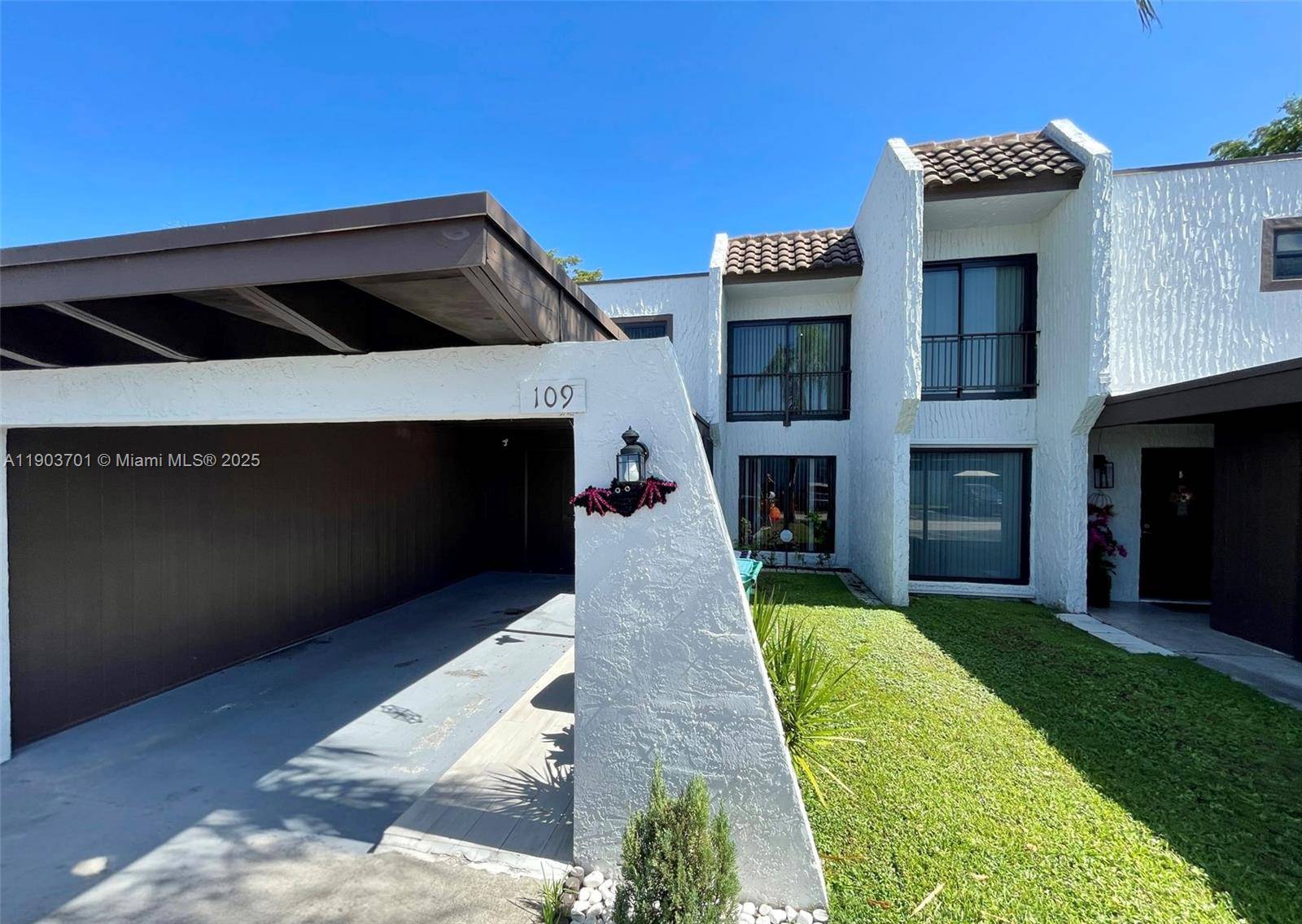 Rarely available for sale in Spanish Villas, this spacious two story townhouse, with golf course views, has been recently improved with impact windows all around, refreshed bathrooms and kitchen, paved ...